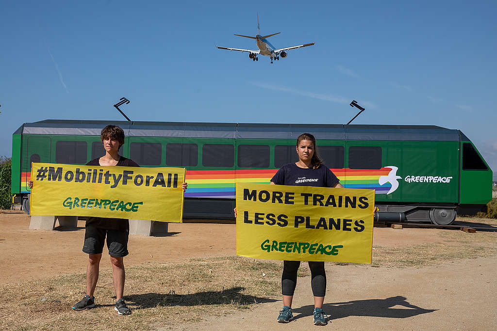 Greenpeace Banner Protest