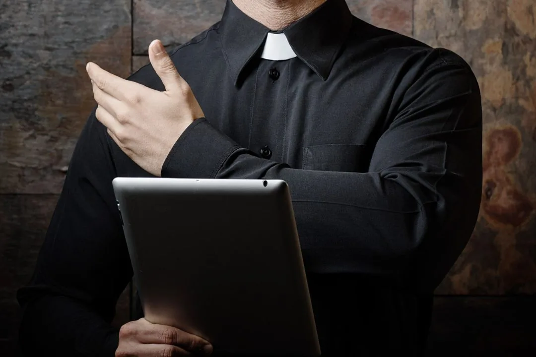 web priest ipad tablet shutterstock 568909744 stocklite ai 1080x720